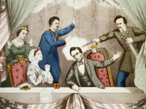 John Wilkes Booth shooting Lincoln as others in the presidential box react in horror.