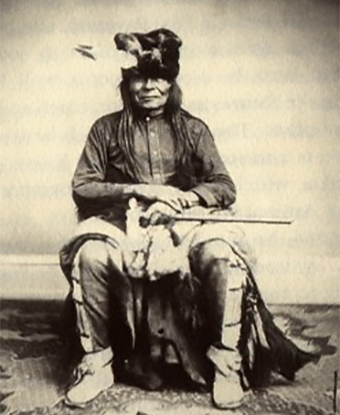 A black and white portrait of Chief Palaneapape, seated and looking at the camera.